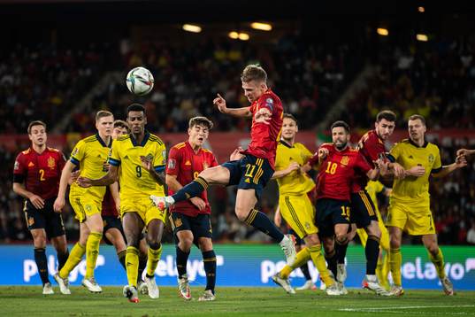 Alexander Isak of Sweden and Dani Olmo of Spain