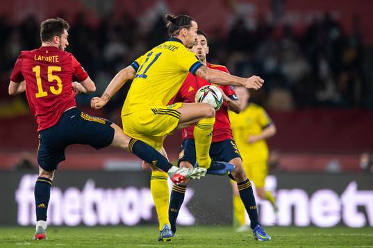 Aymeric Laporte of Spain and Zlatan Ibrahimovic of Sweden