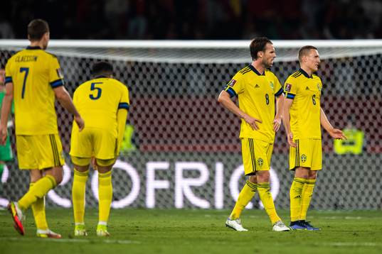 Albin Ekdal and Ludwig Augustinsson of Sweden look dejected