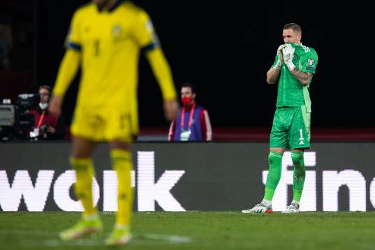 Goalkeeper Robin Olsen of Sweden looks dejected