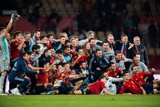 Players of Spain celebrate