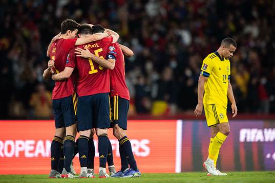 Players of Spain celebrate