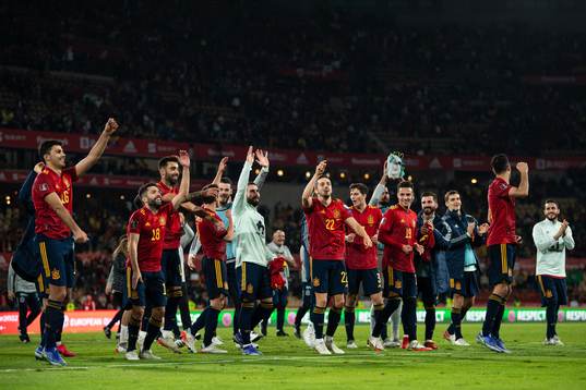 Players of Spain celebrate