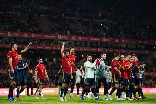 Players of Spain celebrate