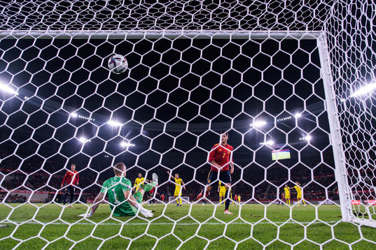 Alvaro Morata of Spain scores 1-0 behind goalkeeper Robin