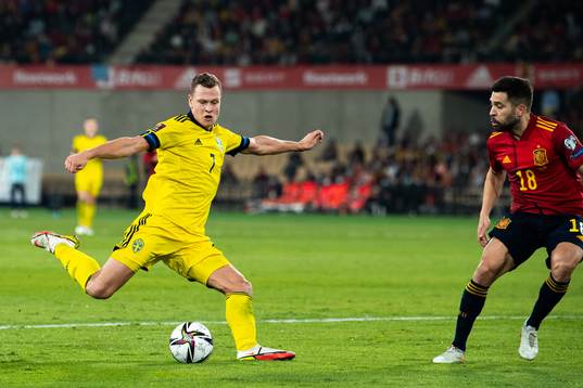 Viktor Claesson of Sweden and Jordi Alba of Spain