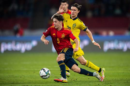 Gavi of Spain and Kristoffer Olsson of Sweden
