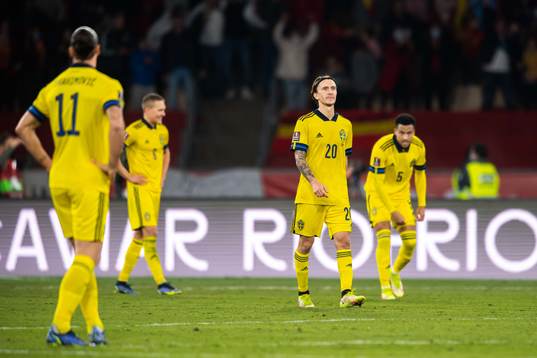 Kristoffer Olsson, Martin Olsson of Sweden look dejected