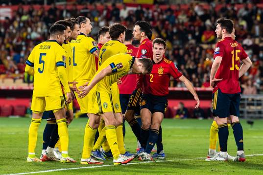 Zlatan Ibrahimovic of Sweden and Sergio Busquets of Spain