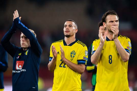Robin Quaison and Albin Ekdal of Sweden look dejected