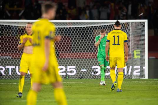 Zlatan Ibrahimovic and goalkeeper Robin Olsen of Sweden