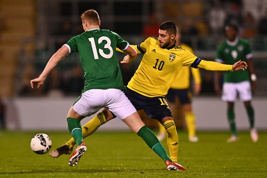 Jake O'Brien of Republic of Ireland and Rami Al Hajj of