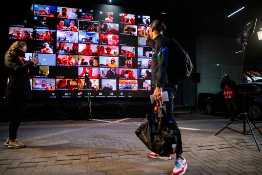 Virgil Van Dijk of Netherlands greets digital spectators
