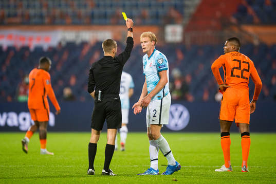 Morten Thorsby of Norway receives a yellow card