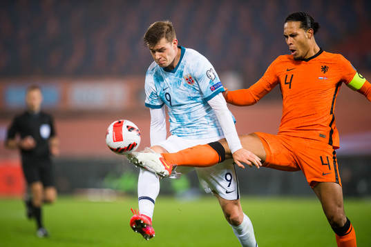 Alexander Sørloth of Norway and Virgil van Dijk of
