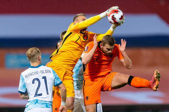 Goalkeeper Jasper Cillessen and Matthijs de Ligt of