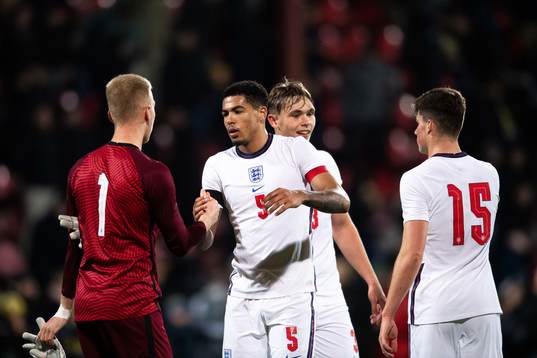 Goalkeeper Matthew Cox and Levi Colwill of England celebrate