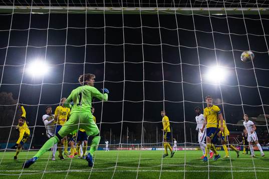 Levi Colwill of England scores the 0-2 goal behind