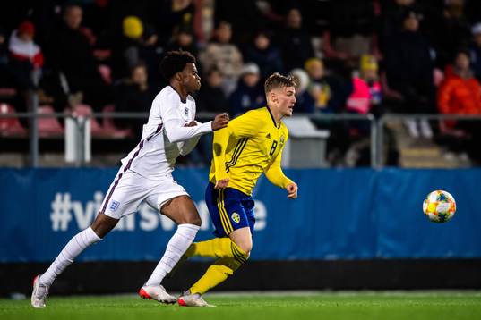 Carney Chuckwuemeka of England and Markus Björkqvist of