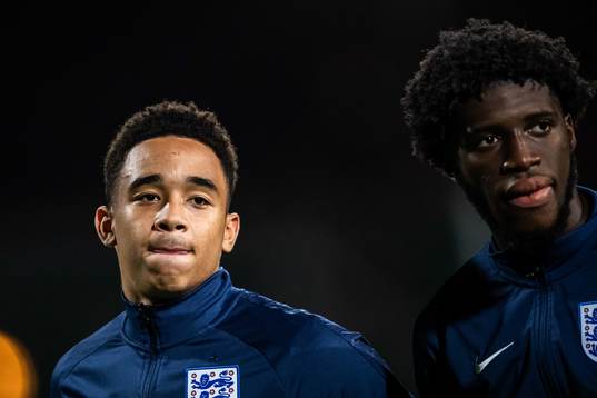 Aaron Ramsey and Samuel Iling-Junior of England at lineup