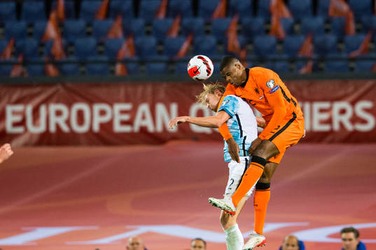 Morten Thorsby of Norway and Denzel Dumfries of Netherlands