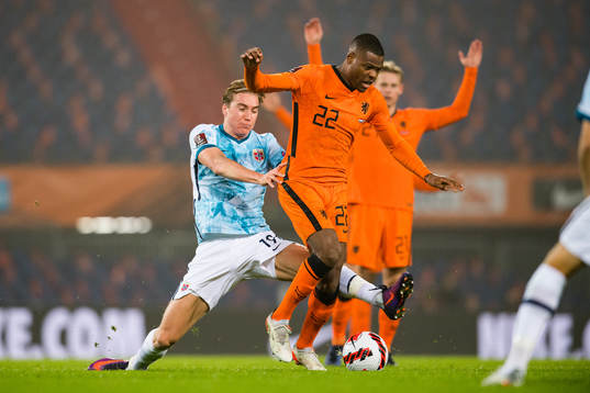 Kristian Thorstvedt of Norway and Denzel Dumfries of