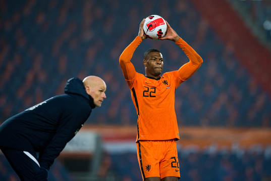 Ståle Solbakken, head coach of Norway and Denzel Dumfries
