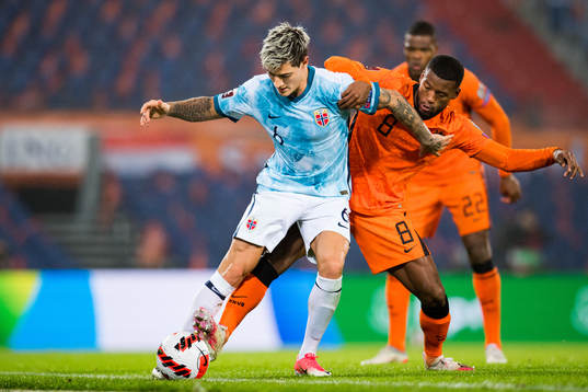 Mathias Normann of Norway and Georginio Wijnaldum of