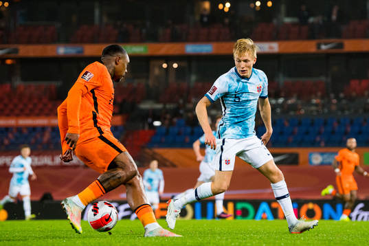 Steven Bergwijn of Netherlands and Birger Meling of Norway