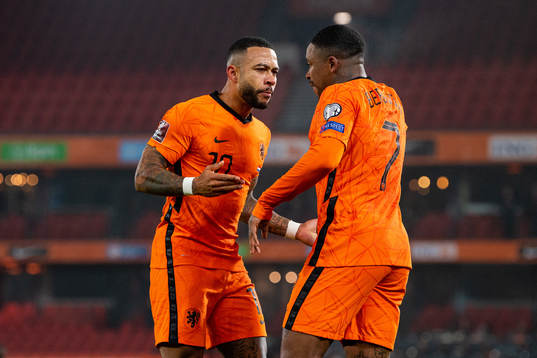 Steven Bergwijn of Netherlands celebrates with teammate