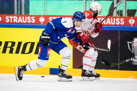 Leksands Patrik Zackrisson and Klagenfurts Rok Ticar