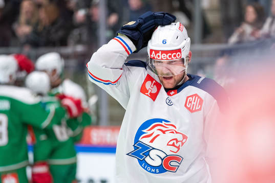 Yannick Weber of Zurich looks dejected