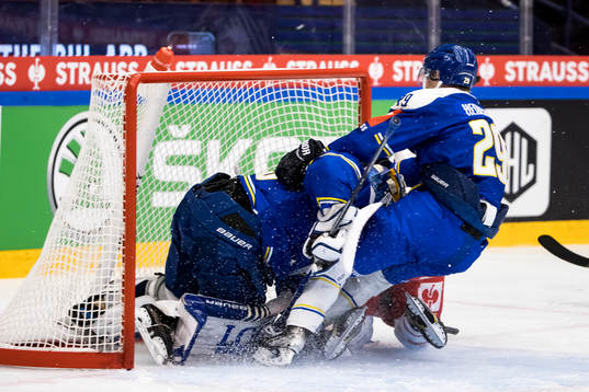 Leksands Emil Heineman and Leksands goaltender Axel Brage
