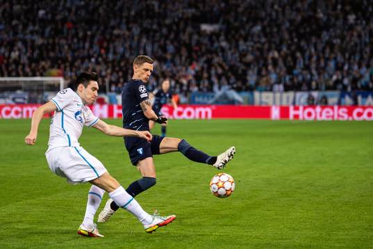 Vyacheslav Karavaev of Zenit and Sören Rieks of Malmö FF
