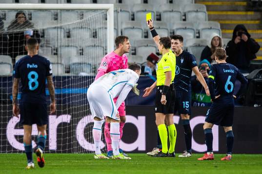 Goalkeeper Johan Dahlin of Malmö FF receives a warning