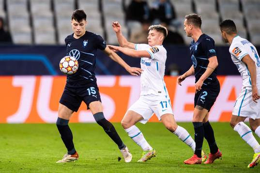 Anel Ahmedhodzic of Malmö FF and Andrey Mostovoy of Zenit