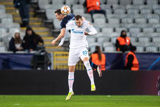 Niklas Moisander of Malmö FF and Artem Dzyuba of Zenit