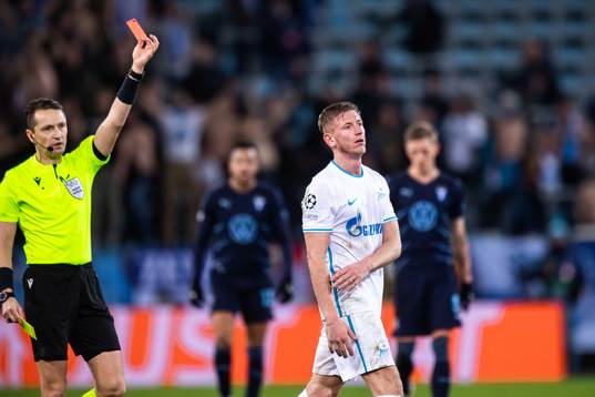 Dmitri Chistyakov of Zenit is shown a red card from deferee
