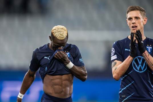 Bonke Innocent and Sören Rieks of Malmö FF look dejected