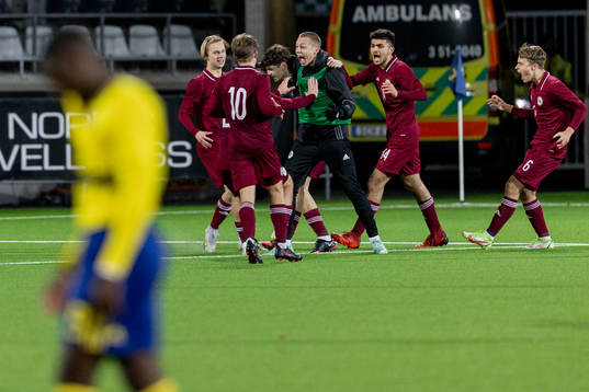 Lettlands spelare jublar