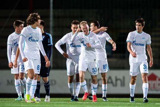 Aleksandr Sandrachuk of Zenit celebrate