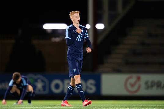 Hugo Larsson of Malmö FF looks dejected