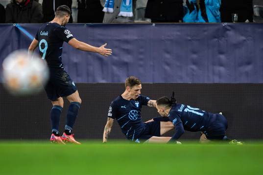 Sören Rieks of Malmö FF celebrate with teammates