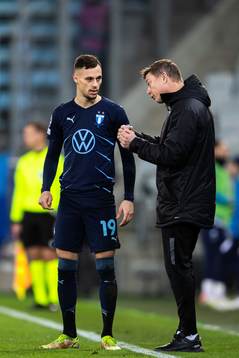 Veljko Birmancevic and Jon Dahl Tomasson, head coach of