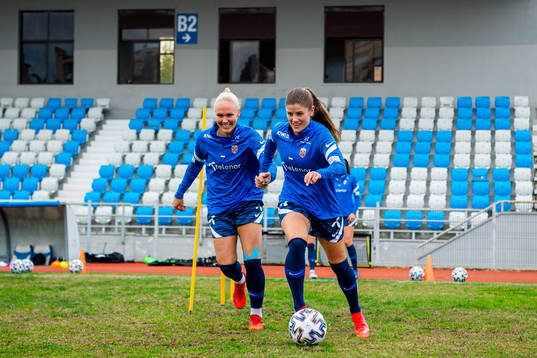 Maria Thorisdottir and Maren Mjelde of the Norwegian