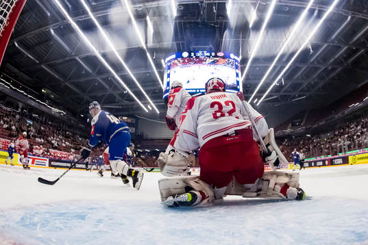 Leksands Carter Ashton and Klagenfurts goaltender Sebastian
