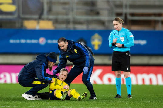 Filippa Curmark of Sweden receives medical attention