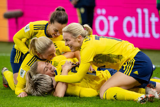 Lina Hurtig of Sweden celebrates scoring 2-1 with team mates