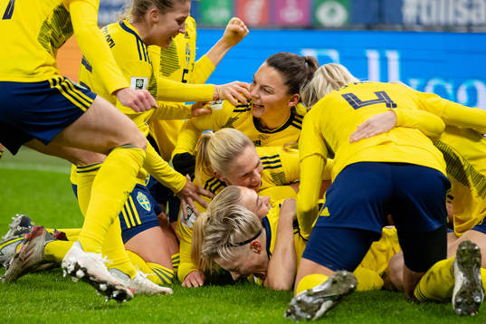 Lina Hurtig of Sweden celebrates scoring 2-1 with team mates