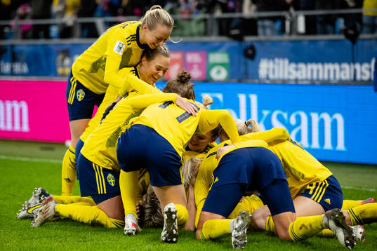 Lina Hurtig of Sweden celebrates scoring 2-1 with team mates